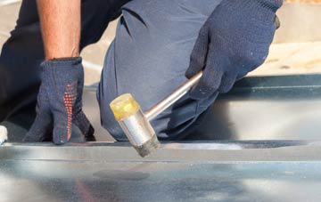 Wooden metal flat roofing repairs